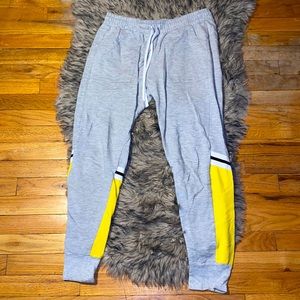 Gray and yellow sweatpants